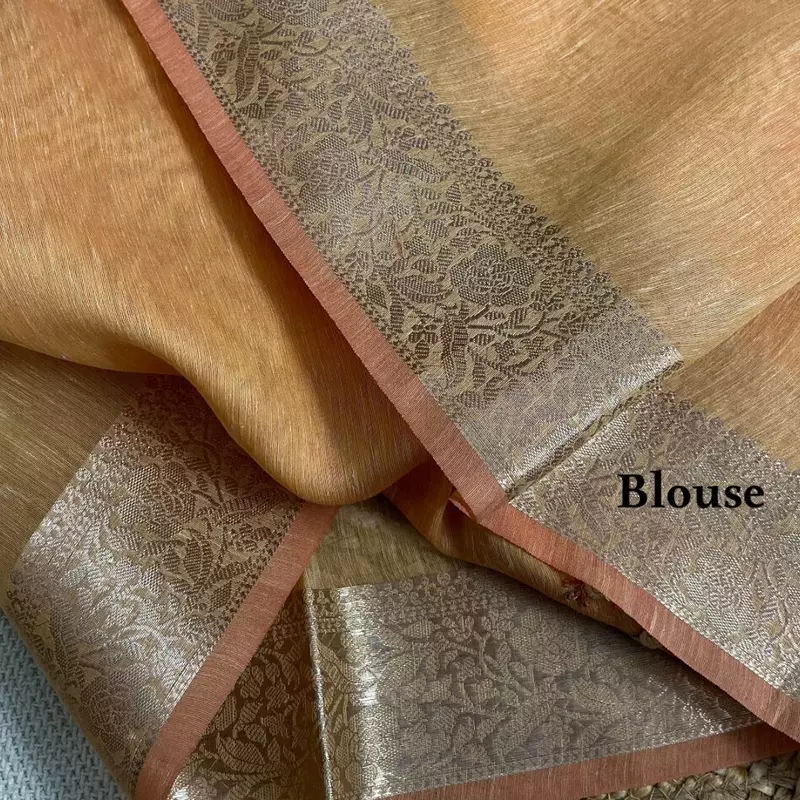 Peach-Orange Tissue Linen Saree with Intricate French Knot Embroidery and Zari Borders