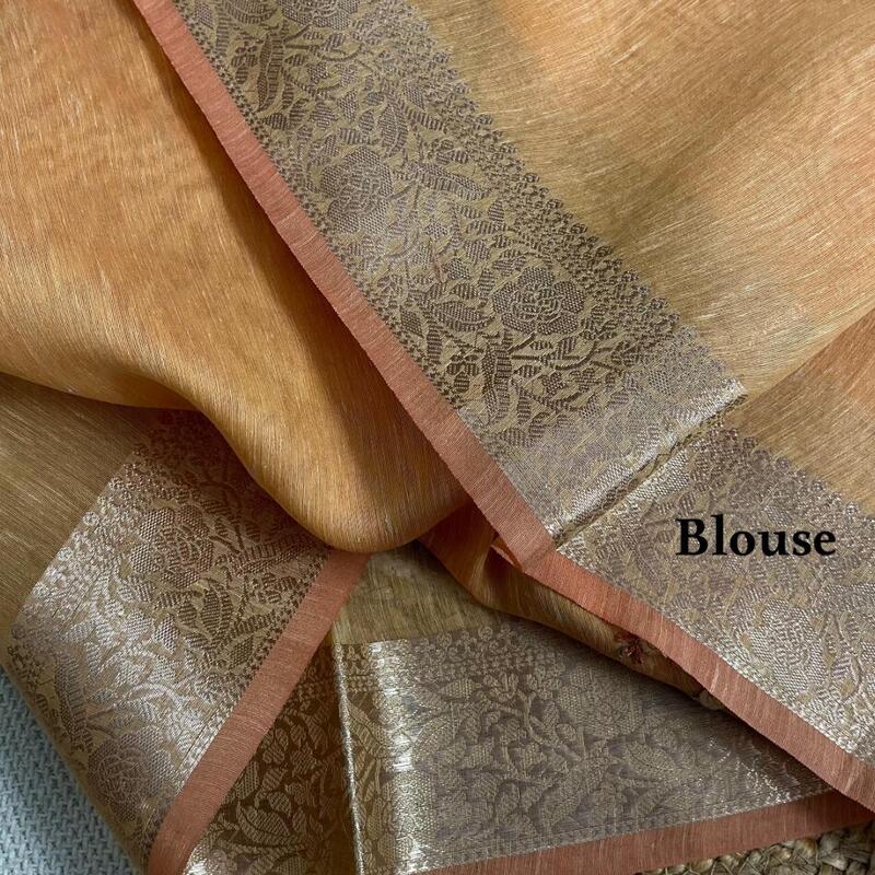 Peach-Orange Tissue Linen Saree with Intricate French Knot Embroidery and Zari Borders