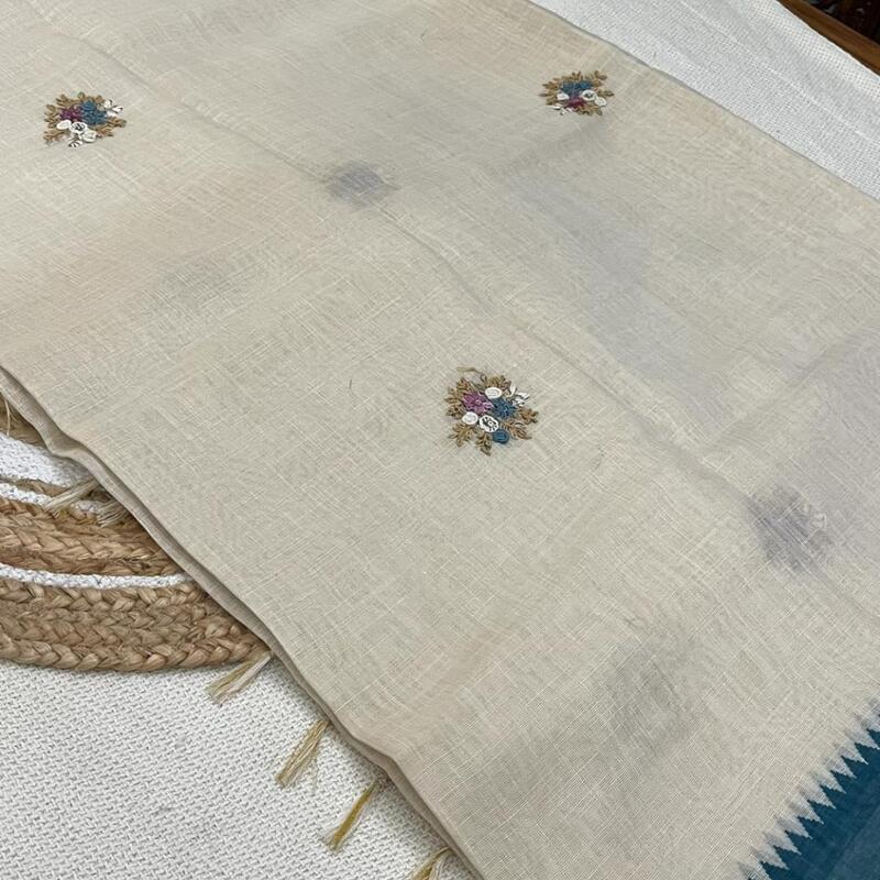 Ivory Tissue Silk Saree with Teal Temple Border and Floral Embroidery