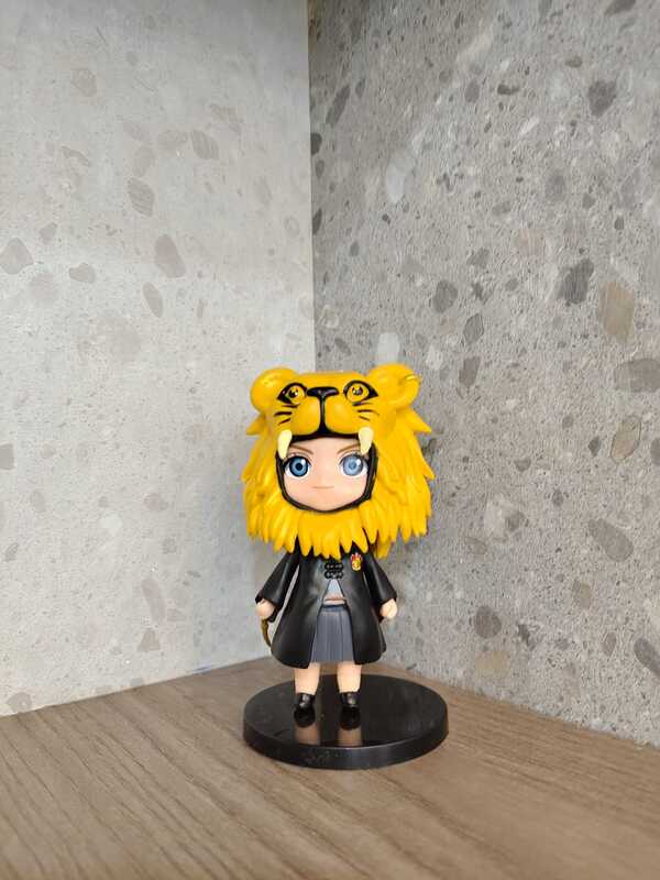 Hermione Granger action figures holding his wand.