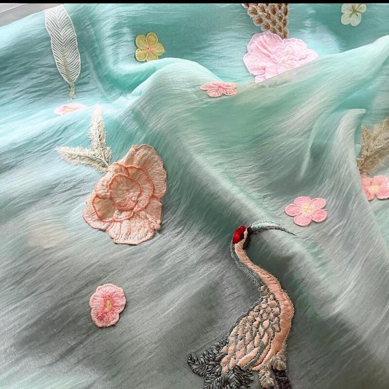 Ethereal Seafoam Green Crushed Organza Saree with 3D Floral & Avian Appliqué