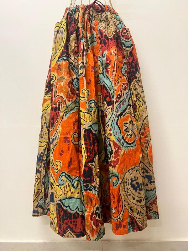 Aira's flared & panelled skirt - orange & paisleys