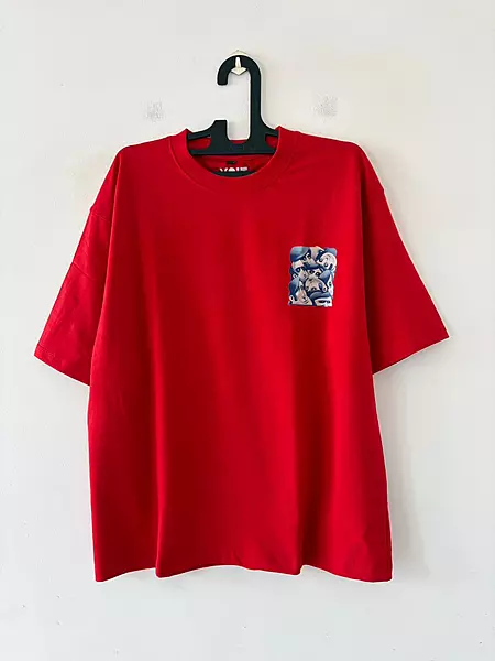 Red caricature pocket oversized tee