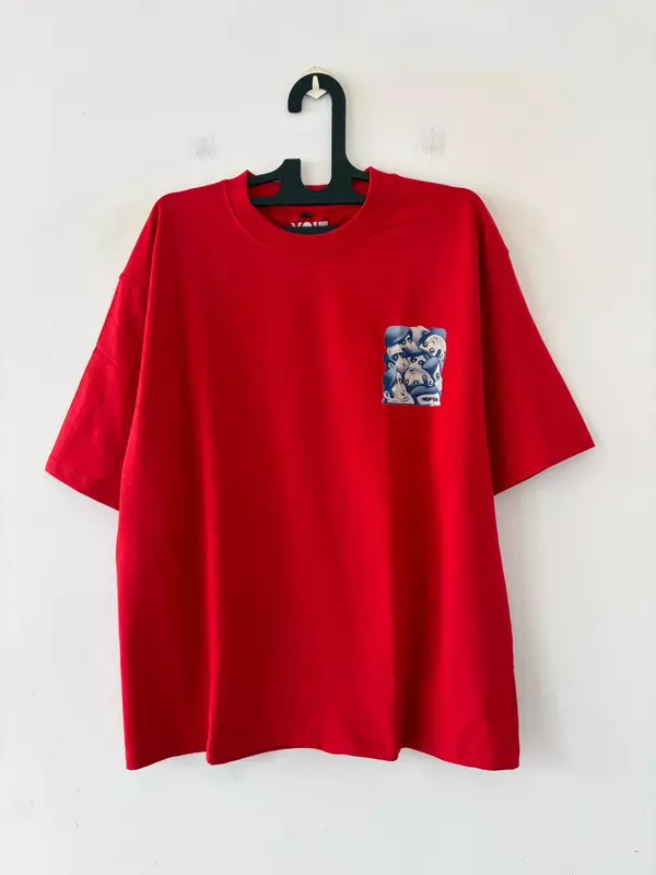 Red caricature pocket oversized tee
