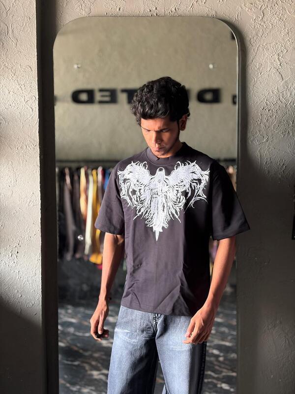 Black mythic wing oversized tee