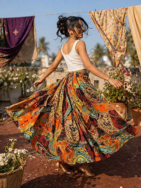 Aira's flared & panelled skirt - orange & paisleys