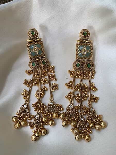 The 'Mughal Heritage' Emerald and Grey Stone Ghungroo Dangle Earrings The 'Mughal Heritage' Emerald and Grey Stone Ghungroo Dangle Earrings