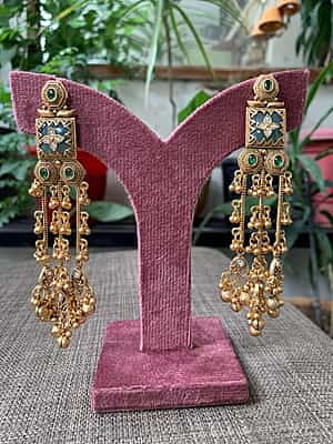 The 'Mughal Heritage' Emerald and Grey Stone Ghungroo Dangle Earrings The 'Mughal Heritage' Emerald and Grey Stone Ghungroo Dangle Earrings