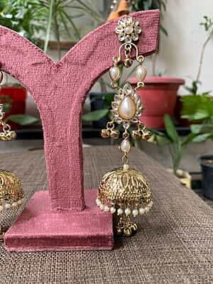 Maharani Gold-Plated Kundan and Pearl Chandelier Jhumka Earrings Maharani Gold-Plated Kundan and Pearl Chandelier Jhumka Earrings