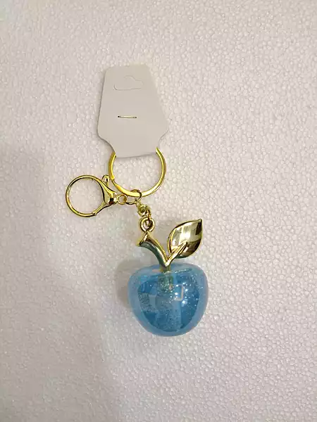 A Charming Blue Glitter Apple Keychain