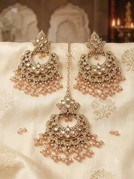 Traditional Indian earing with maang tikka