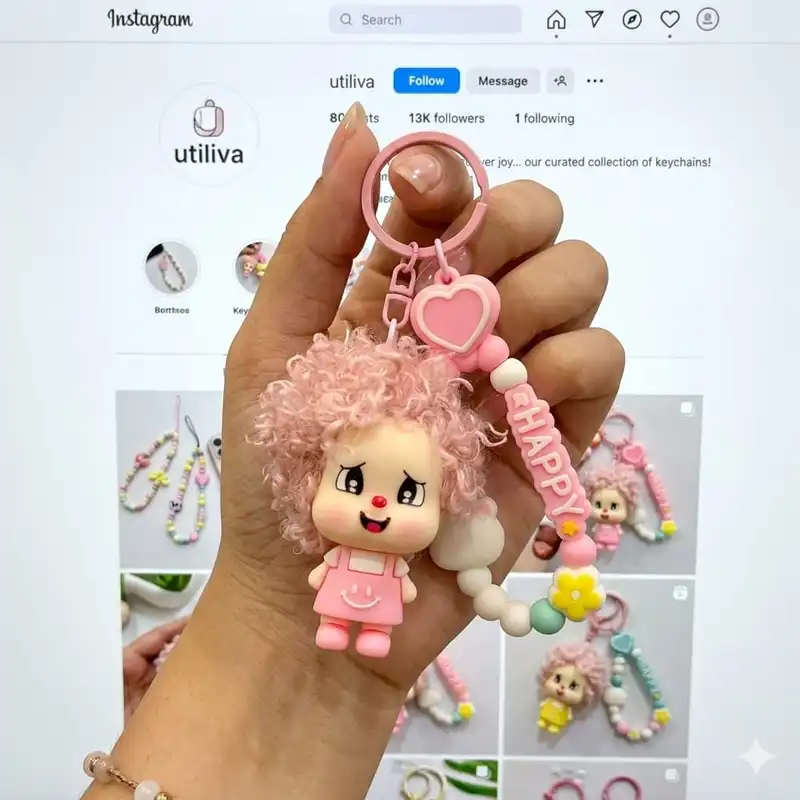 A pink Curly-Hair Cartoon Doll Bag Charm / keychain