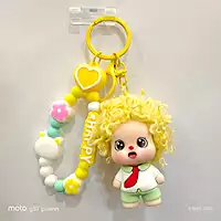 A Yellow Curly-Haired Cartoon Doll Bag Charm / keychain