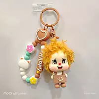 A Brown Curly-Haired Cartoon Doll  Bag Charm / keychain