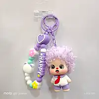 A Purple Curly-Haired Cartoon Doll Bag Charm / keychain