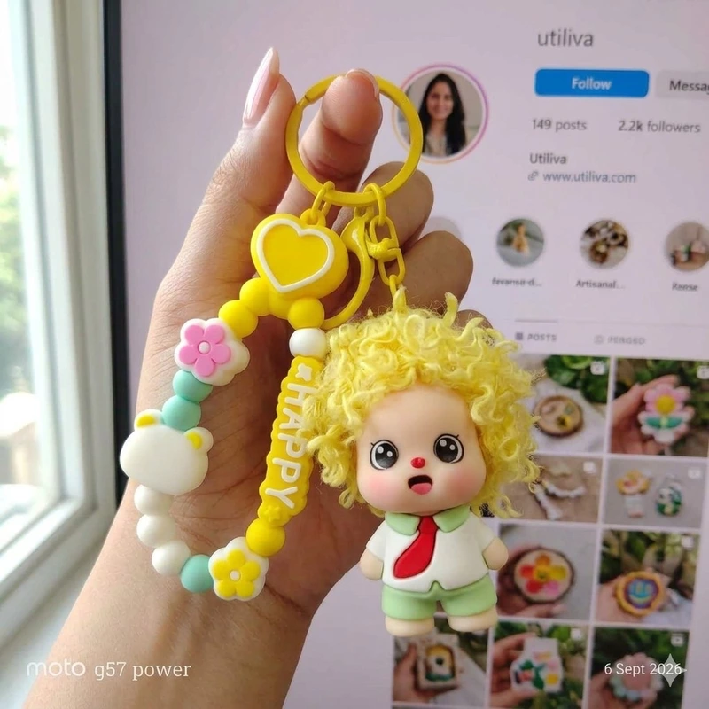 A Yellow Curly-Haired Cartoon Doll Bag Charm / keychain