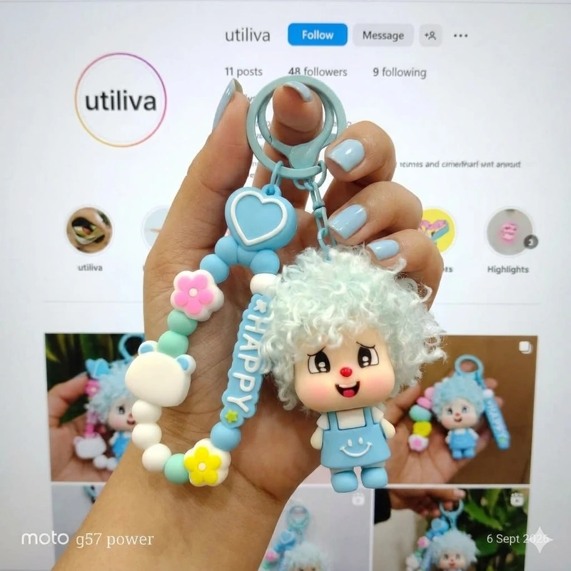 A Light blue Curly-Haired Cartoon Doll  Bag Charm / keychain