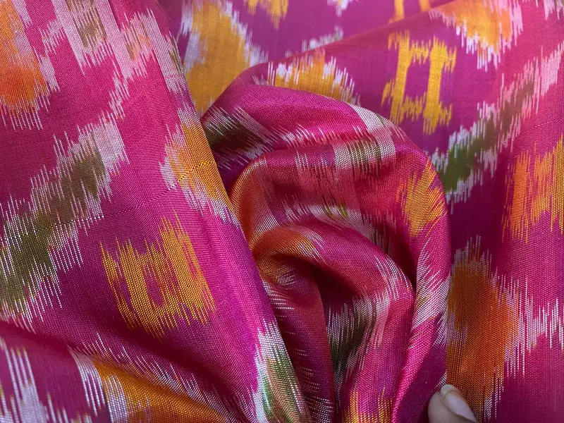 Teal green silk saree with silver buttas with pochampally pink pallu