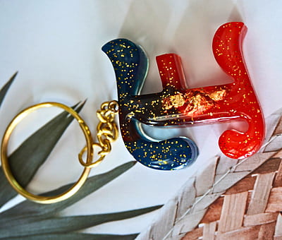 'E' PASSION KEYCHAIN9LKI00013) 'E' PASSION KEYCHAIN9LKI00013)