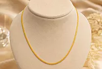 18 kt Gold Sovereign Woven Chain