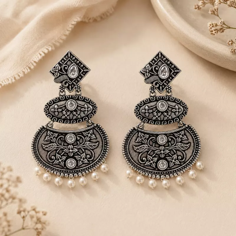 Taralika Clear Stone Pearl Oxidised Chandbali Earrings