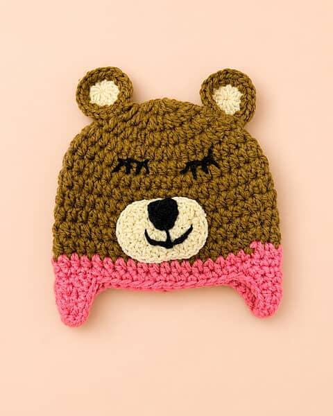 Honey Bear Pink Earflap Cap (0–6 Months) Honey Bear Pink Earflap Cap (0–6 Months)