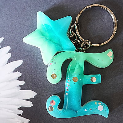 'E' ASTER INSPIRED LETTER KEYCHAIN(LKI00006) 'E' ASTER INSPIRED LETTER KEYCHAIN(LKI00006)