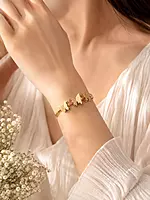 Triple Butterfly Bangle Bracelet with Crystal Accent in Gold