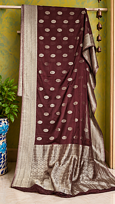Elegant Maroon Khaddi Saree with Intricate Metallic Leaf Motifs & Rich Woven Border Elegant Maroon Khaddi Saree with Intricate Metallic Leaf Motifs & Rich Woven Border