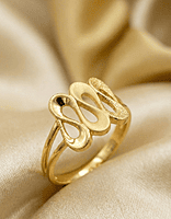 18 kt gold swirl ring
