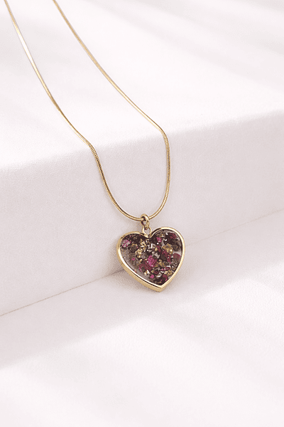Gold heart pendant with flowers