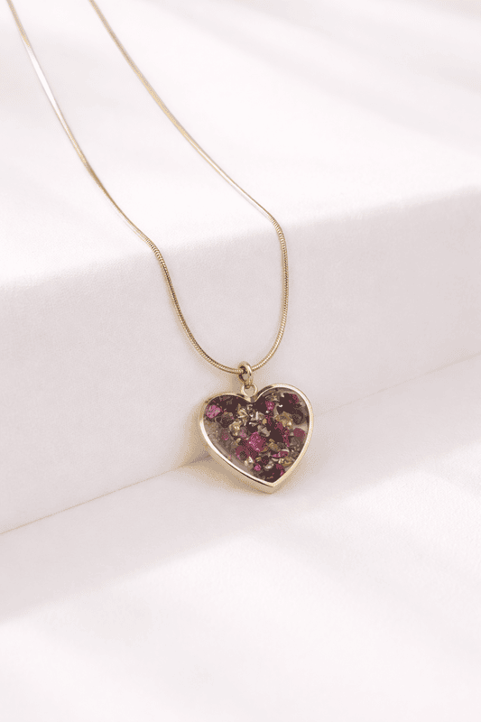 Gold heart pendant with flowers