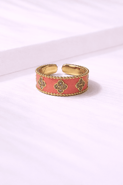Gold ring with coral pink enamel