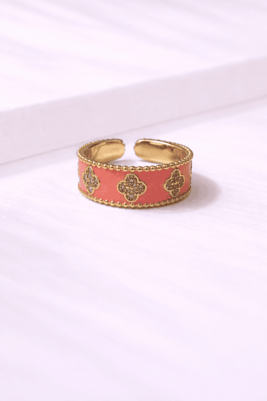 Gold ring with coral pink enamel