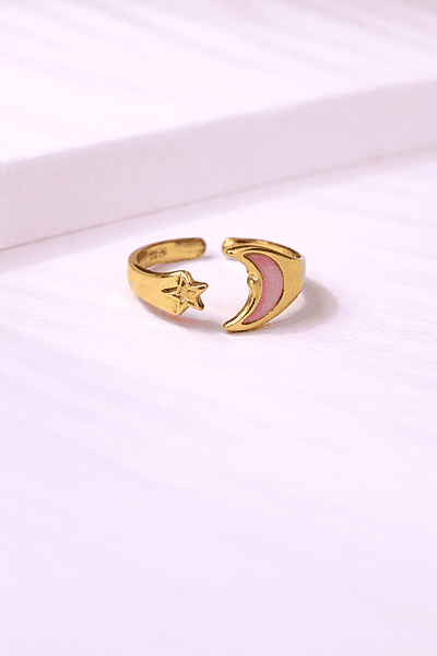 Gold ring with moon and star