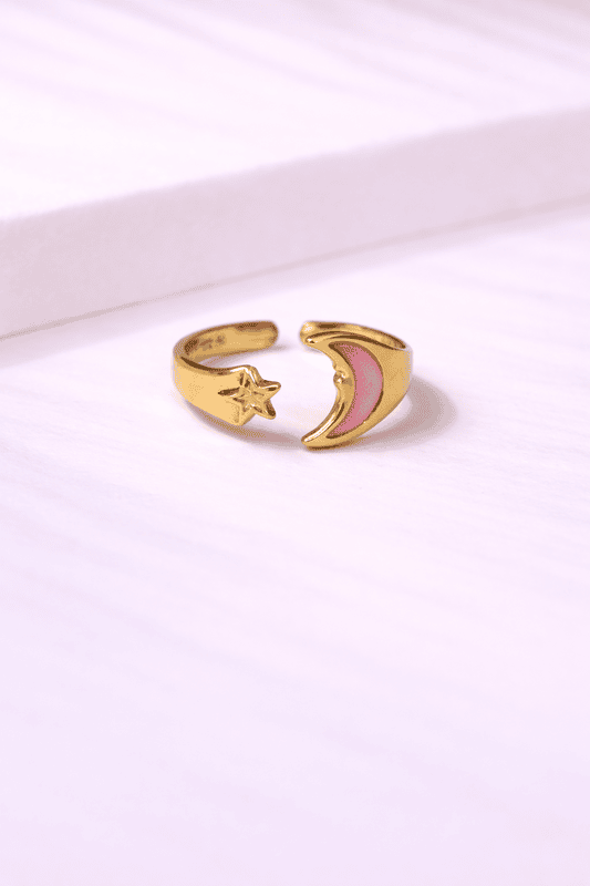 Gold ring with moon and star