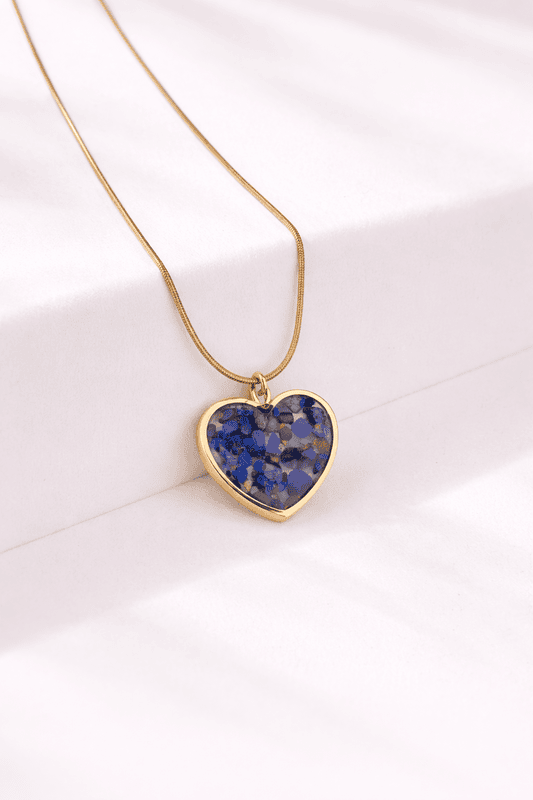 Heart-shaped gold pendant with lapis lazuli