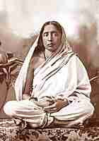 Holy Mother Sri Sarada Devi Photo - Studio with Lily Plant