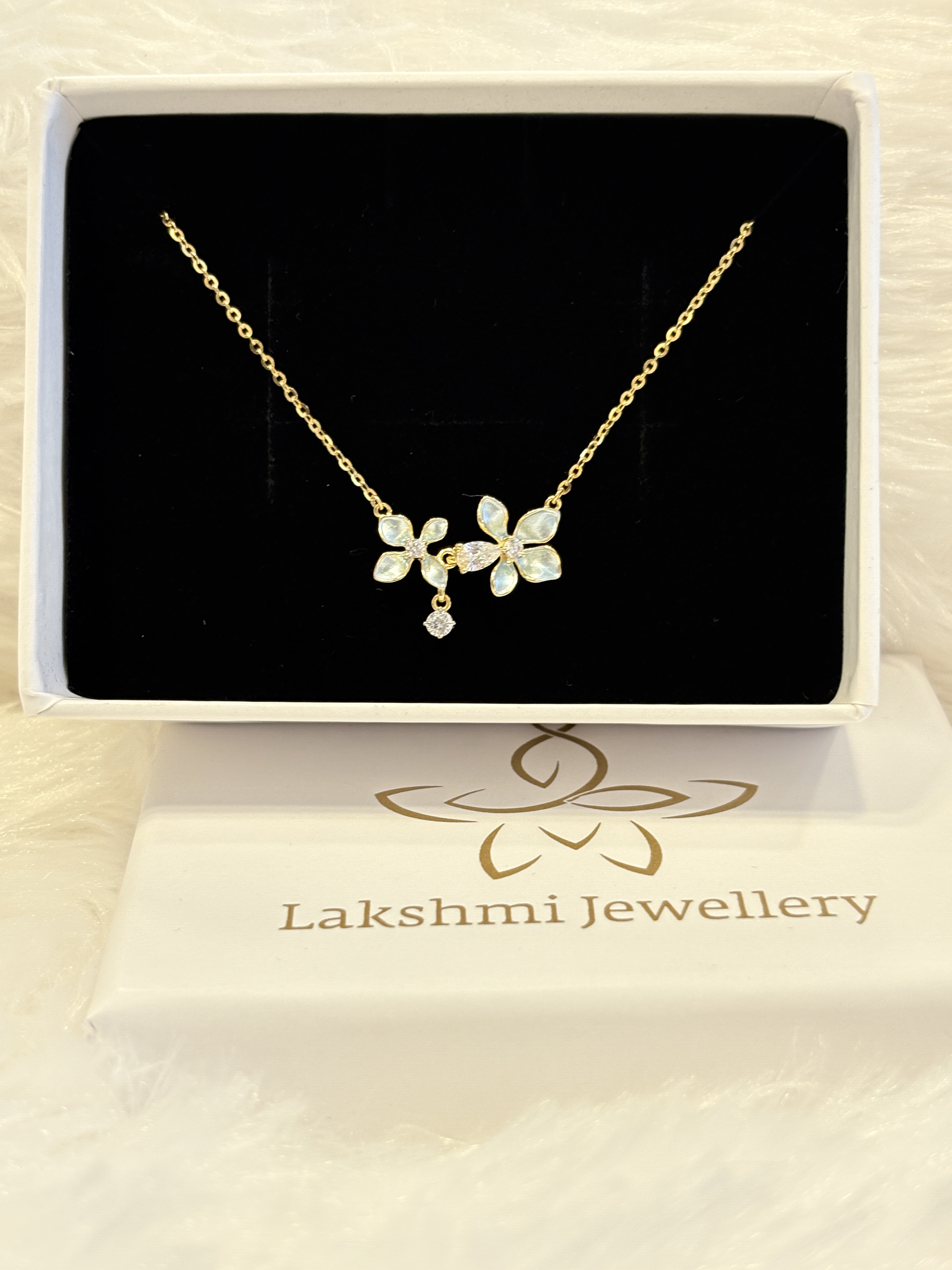 Silver malar chain with gold finish
