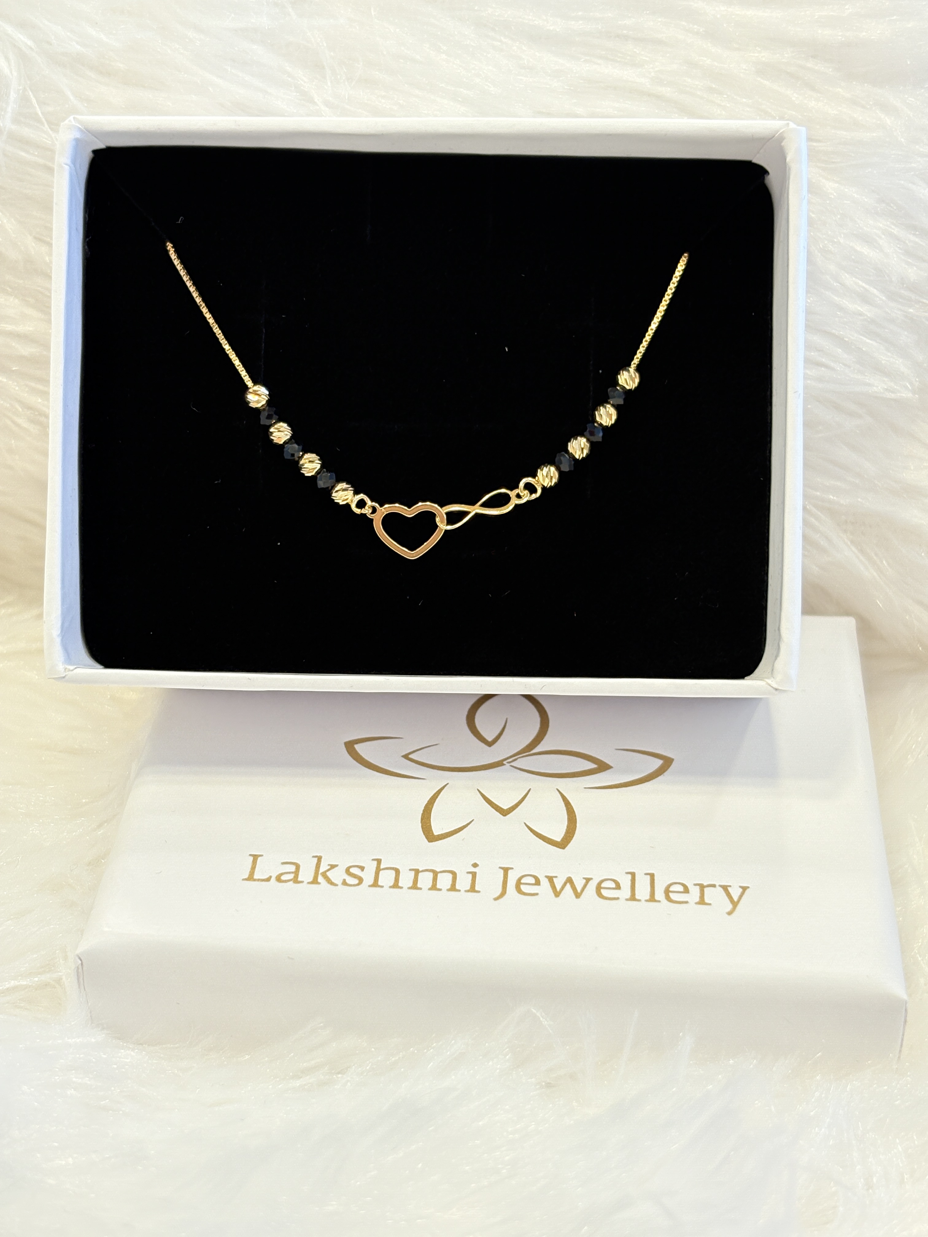 Silver black heart chain with gold finish