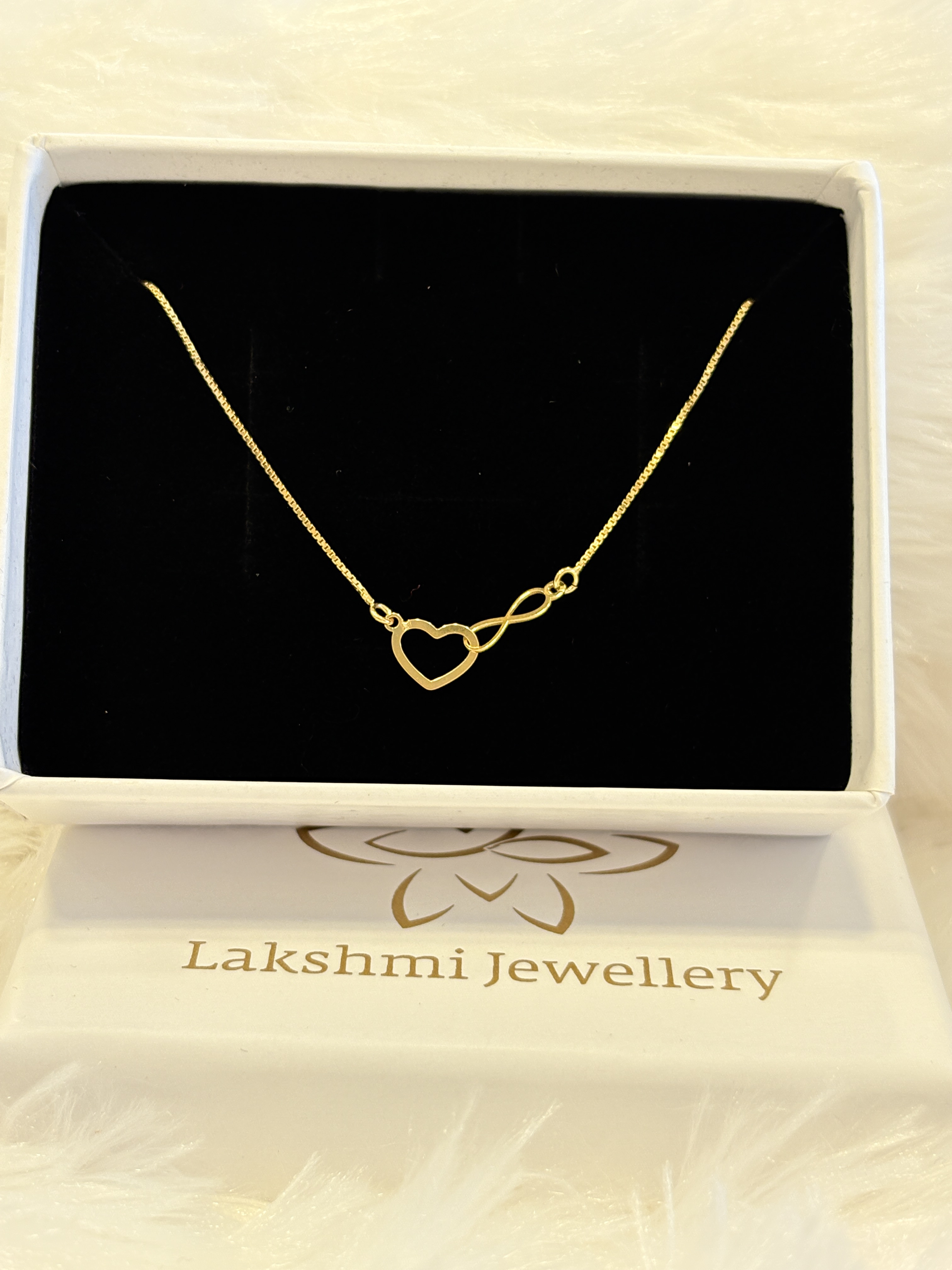 Silver heart infinity chain with