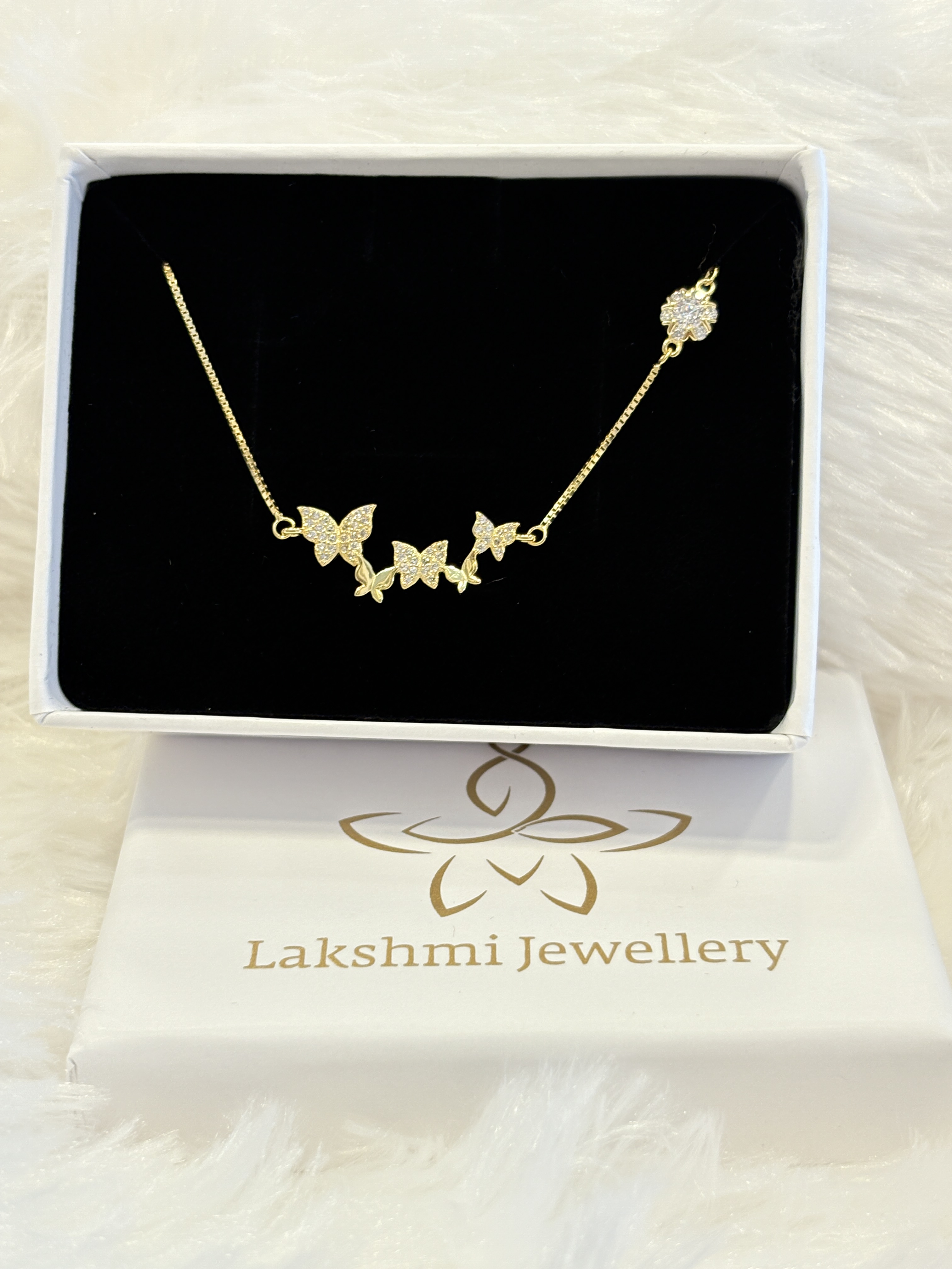 Silver multiple butterfly with gold finish