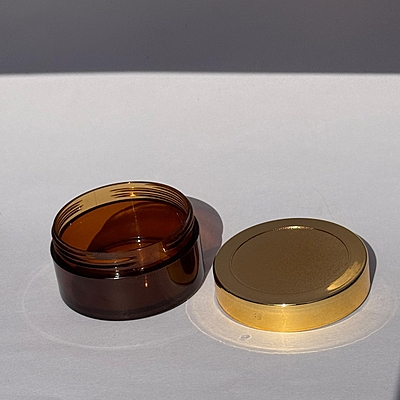 Acrylic San Jar Amber + White Inner + GOLDEN Cap - 25g Acrylic San Jar Amber + White Inner + GOLDEN Cap - 25g