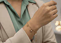 18 kt Gold Floral & Heart Charm Bracelet