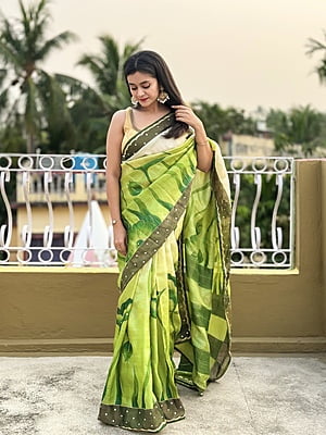 Shades of green and white on pure Tassar katdana work