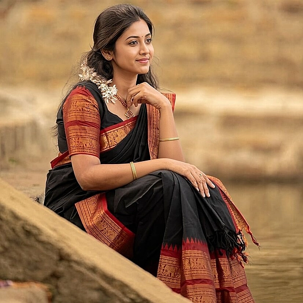 black Pure Kanchi Cotton saree with maroon elephant and peacock zari border
