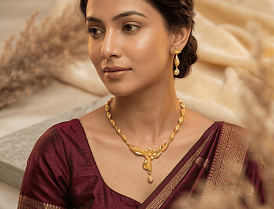 18 kt Gold Abstract Ribbon Necklace Set