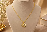 18 kt Gold Intertwined Hearts Necklace