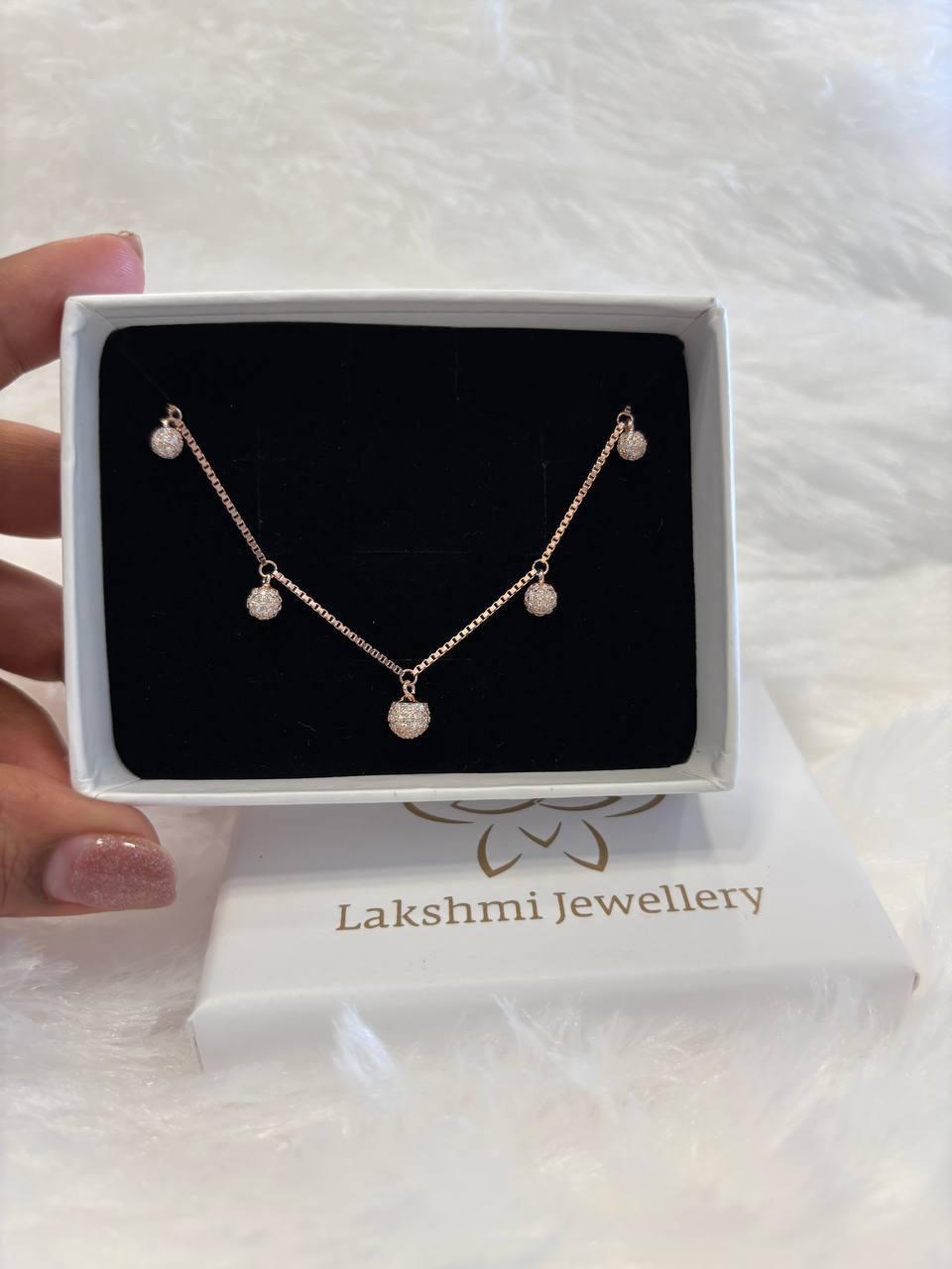 Silver round ball charms bracelet with rosegold finish