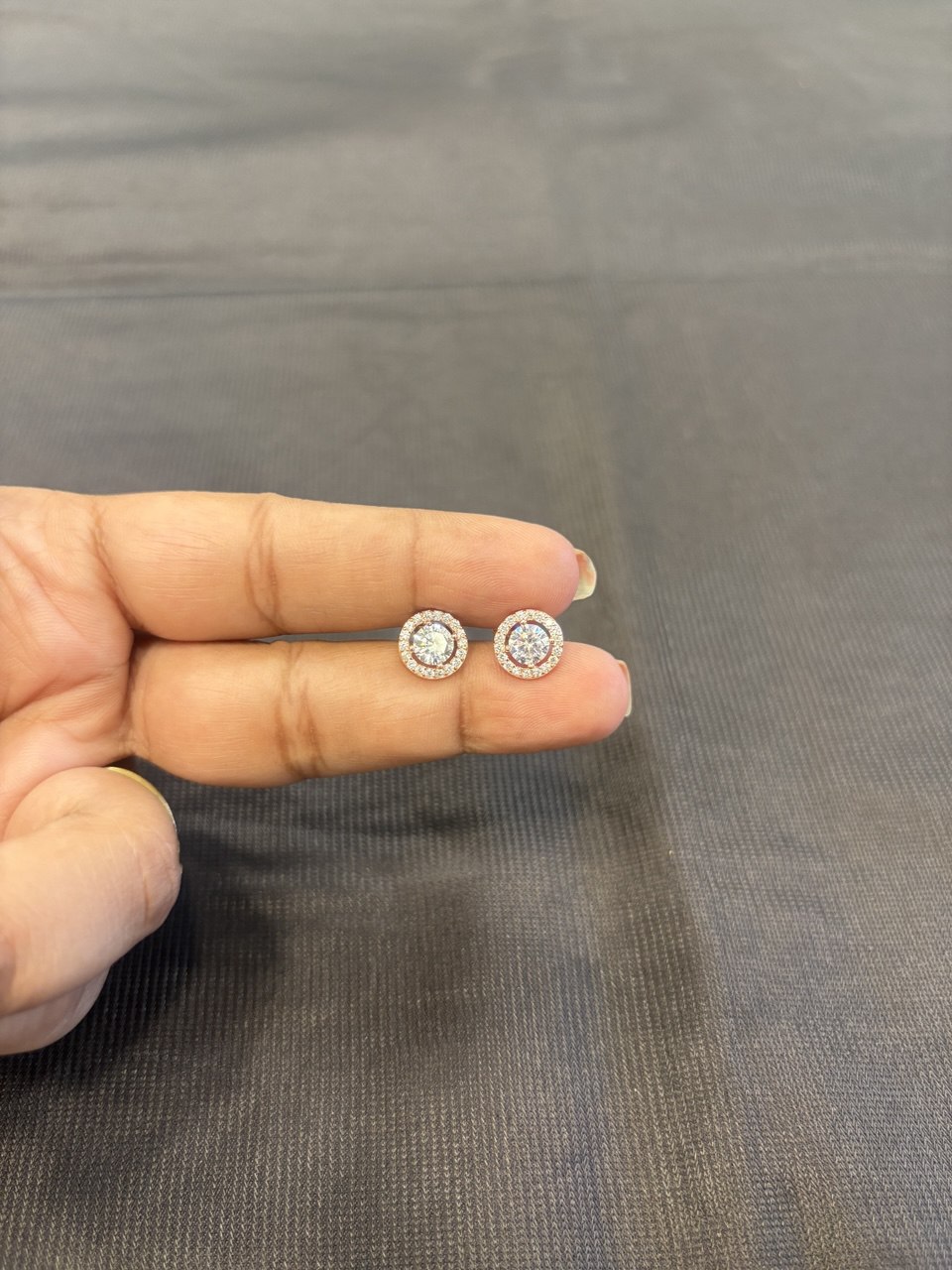 Silver white round stone stud with rosegold finish